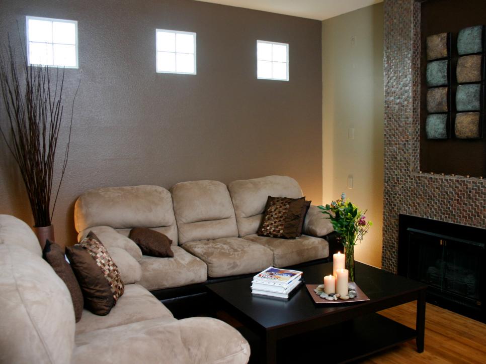 Brown Living Room With Suede Sofas and Tile Fireplace