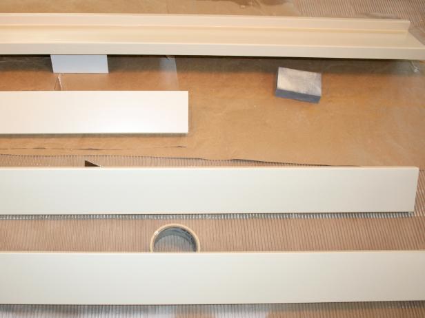Whitewashed Pieces of Trim Dry on Crate Paper