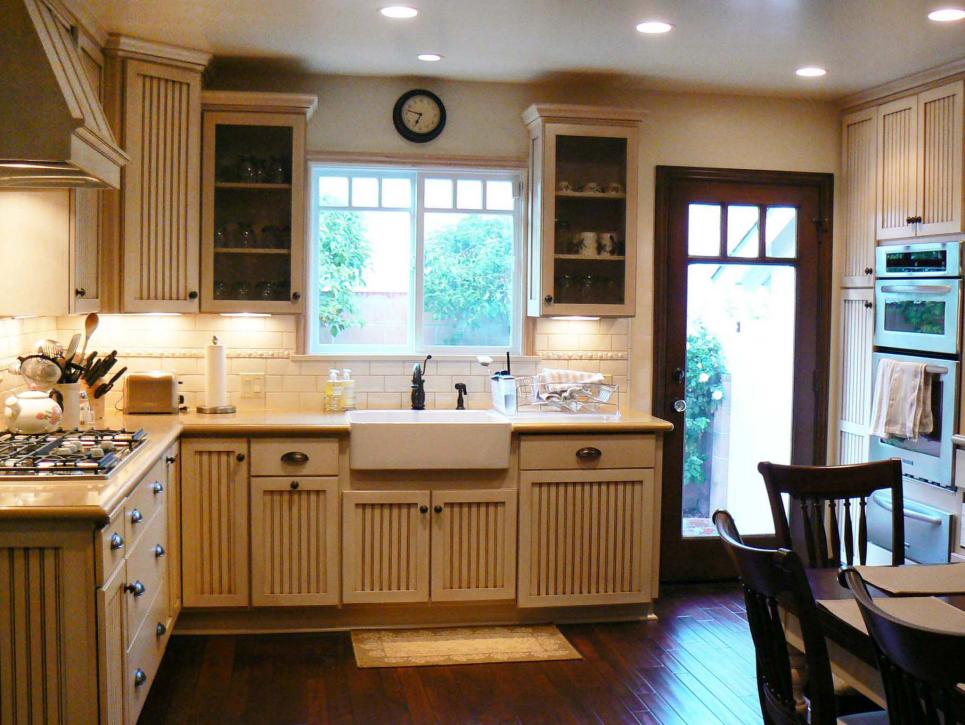 Cottage Kitchen in Neutral Color Palette With Dark Wood Floors