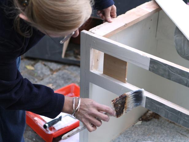 Use a paintbrush to apply the paste directly to the vanity and press firmly in place.