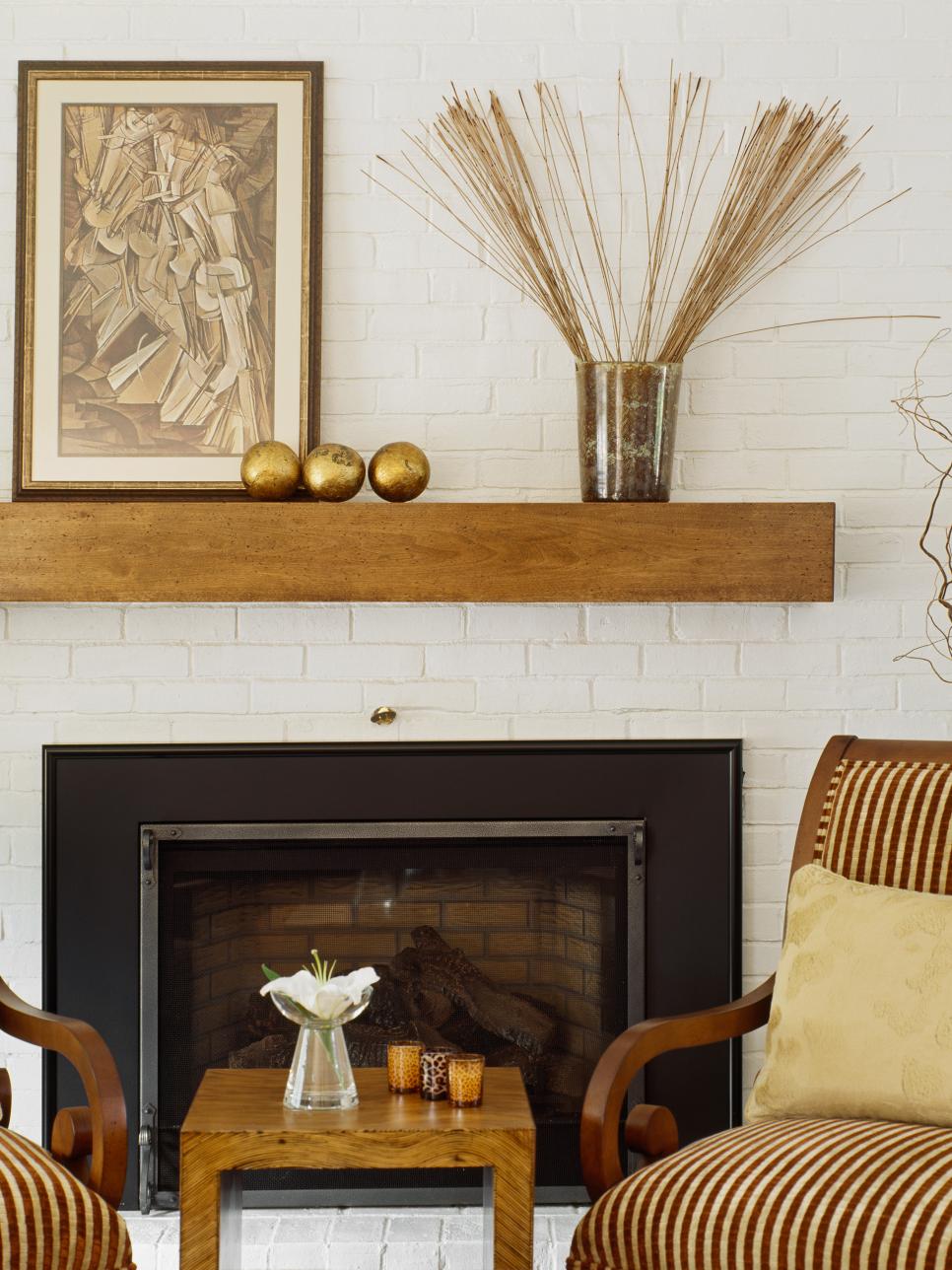 Traditional Fireplace With Brick Wall Backdrop