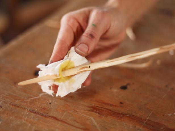 Coat sticks with a food-grade oil or wax to make removing hot s'mores easier.