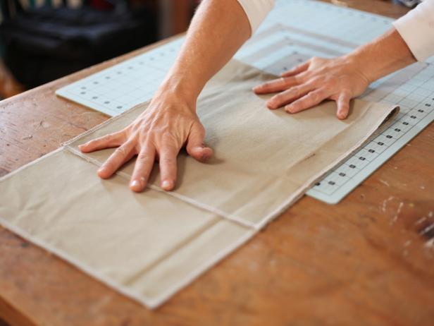 Measure Fabric to Create Backpack Body Measuring Beige Fabric