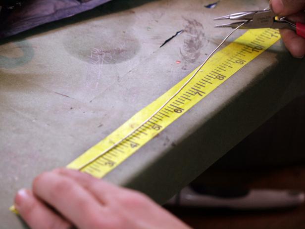 Measure and use wire cutters to cut a 10-inch piece of wire to create a miniature bird's nest for the natural branch necklace.