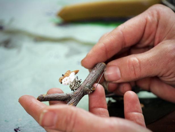 Slide head pin through bird, nest and branch. To secure, add a small bead to the bottom then trim and curl the end of the head pin.