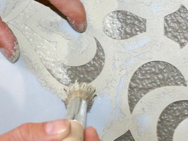 Hold Stencil in Place While Painting Hold Stencil in Place While Painting
