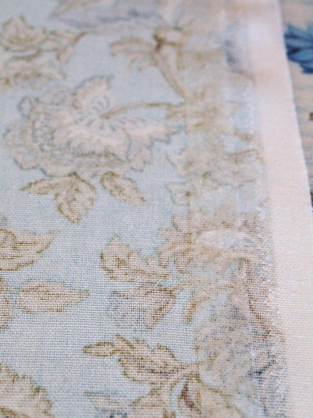 Fold the fabric under 1 inch seam allowance on the right side and press.