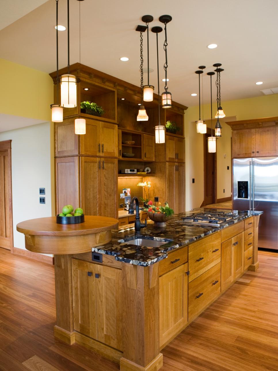 Craftsman Kitchen With Pendant Lights and Large Island