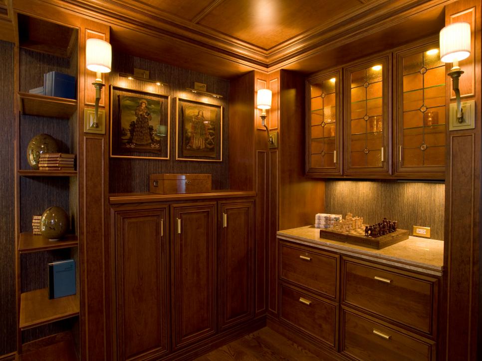 Traditional Office With Wood Cabinets and Bookshelves