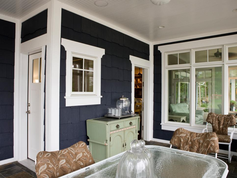 Screened Porch With Navy Blue Shingles and White Trim