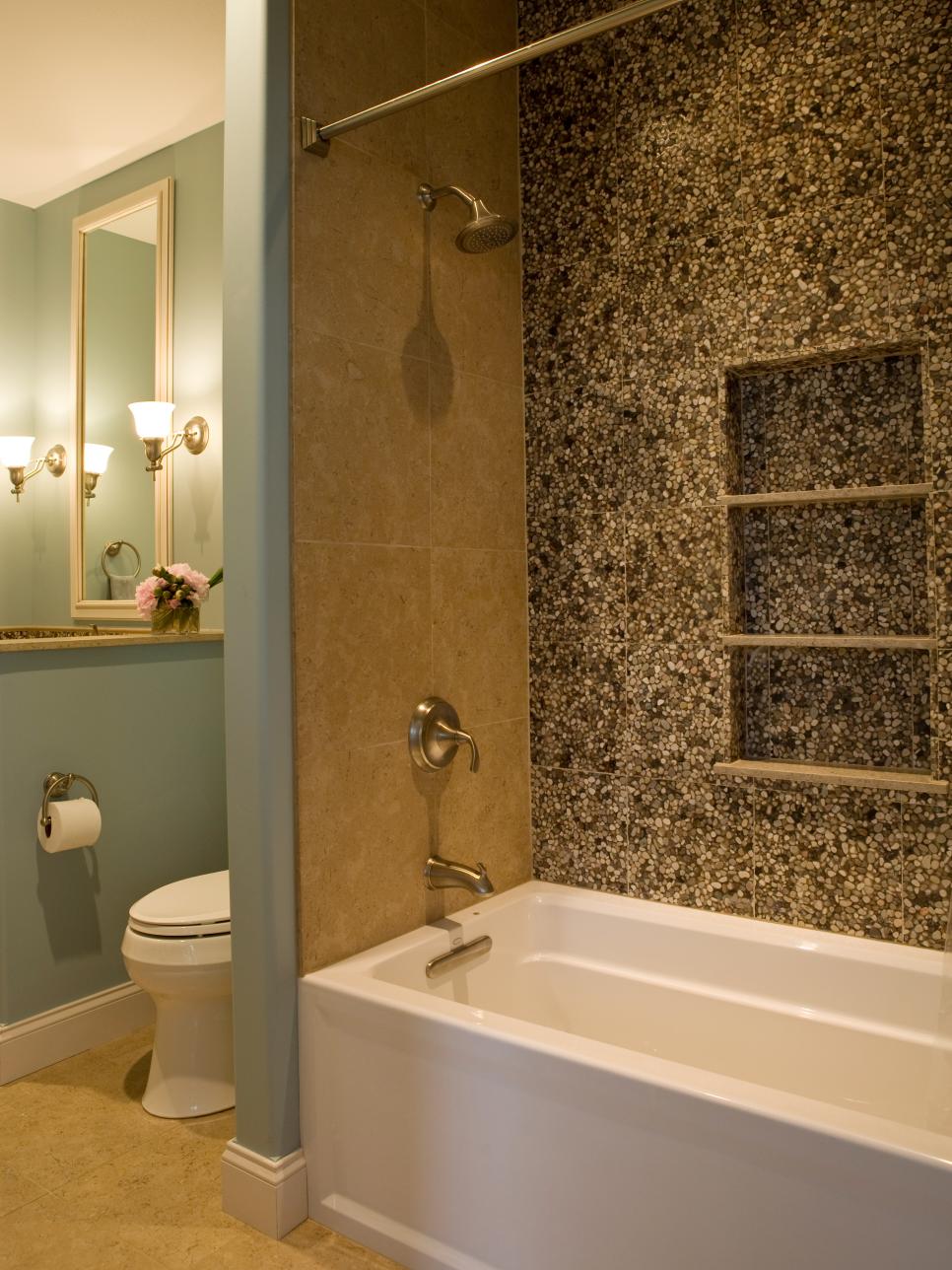 Neutral Transitional Bathroom With Pebble Tile Wall