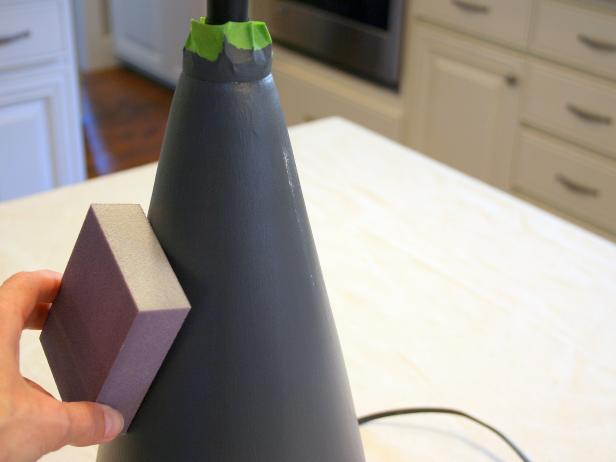 Smooth primed surface with sanding pad then brush on a coat of chalkboard paint; allow to fully dry.