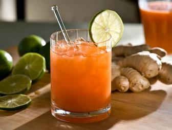Orange Cocktail With Lime Garnish 