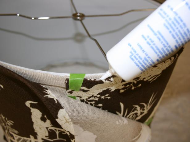 Applying Fabric Glue to Edge of Lampshade