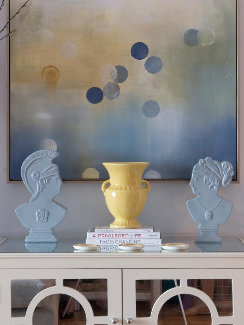 Wall Painting Coordinates With Blue and Yellow Table Accessories