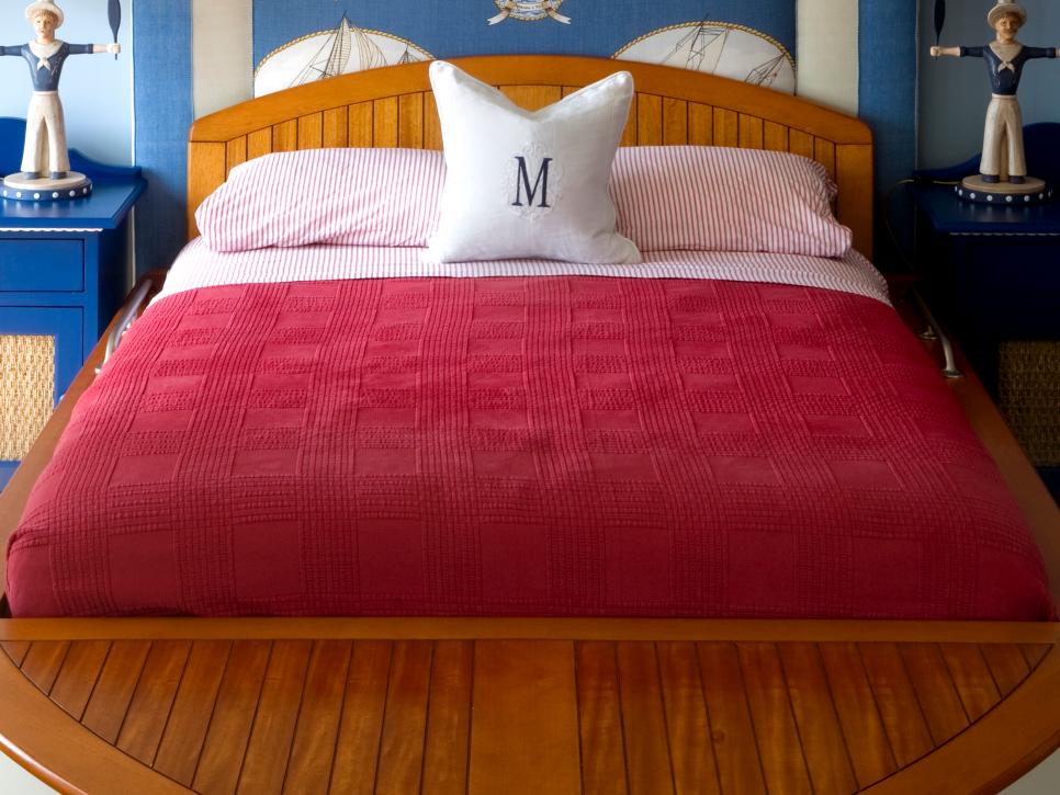 Traditional Blue Boy's Bedroom With Sailor Decor