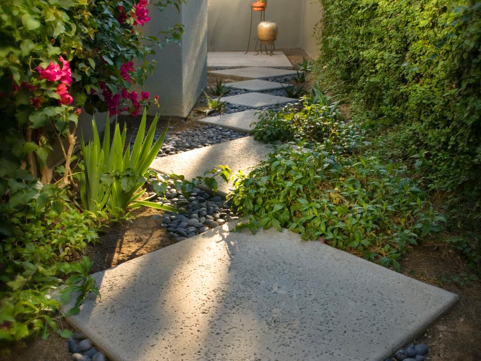 Walkway With Small Pebbles and Square Pavers 