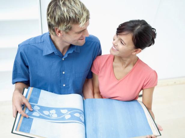 A Couple Choosing Wallpaper Samples A Couple Choosing Wallpaper Samples