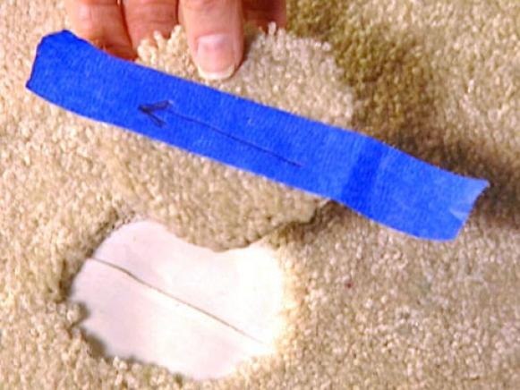 adi401_4fi-tape-with-arrow-on-carpet-piece_s4x3 adi401_4fi-tape-with-arrow-on-carpet-piece_s4x3