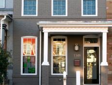 Townhouse With Gray Painted Brick and Small Front Porch