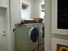 A hardworking laundry space, complete with Energy Star-rated appliances, serves as a family communication center.