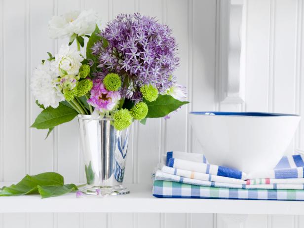 Silver Vase Filled with Purple and White Flowers Silver Vase Filled with Purple and White Flowers