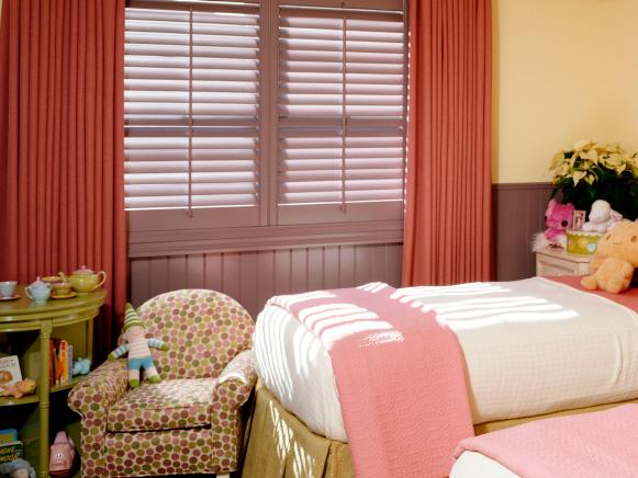 Pink and Yellow Girls' Bedroom With Twin Beds
