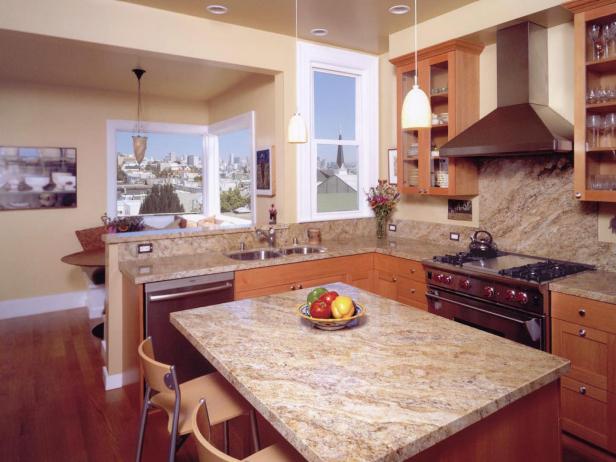 Neutral Contemporary Kitchen With Kitchen Island and Marble Backsplash