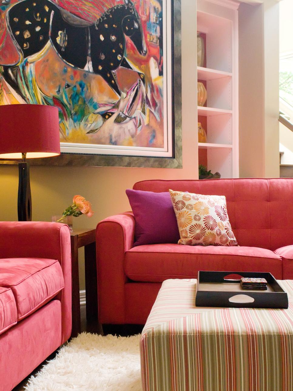 Contemporary Living Room With Red Sofas and Abstract Art