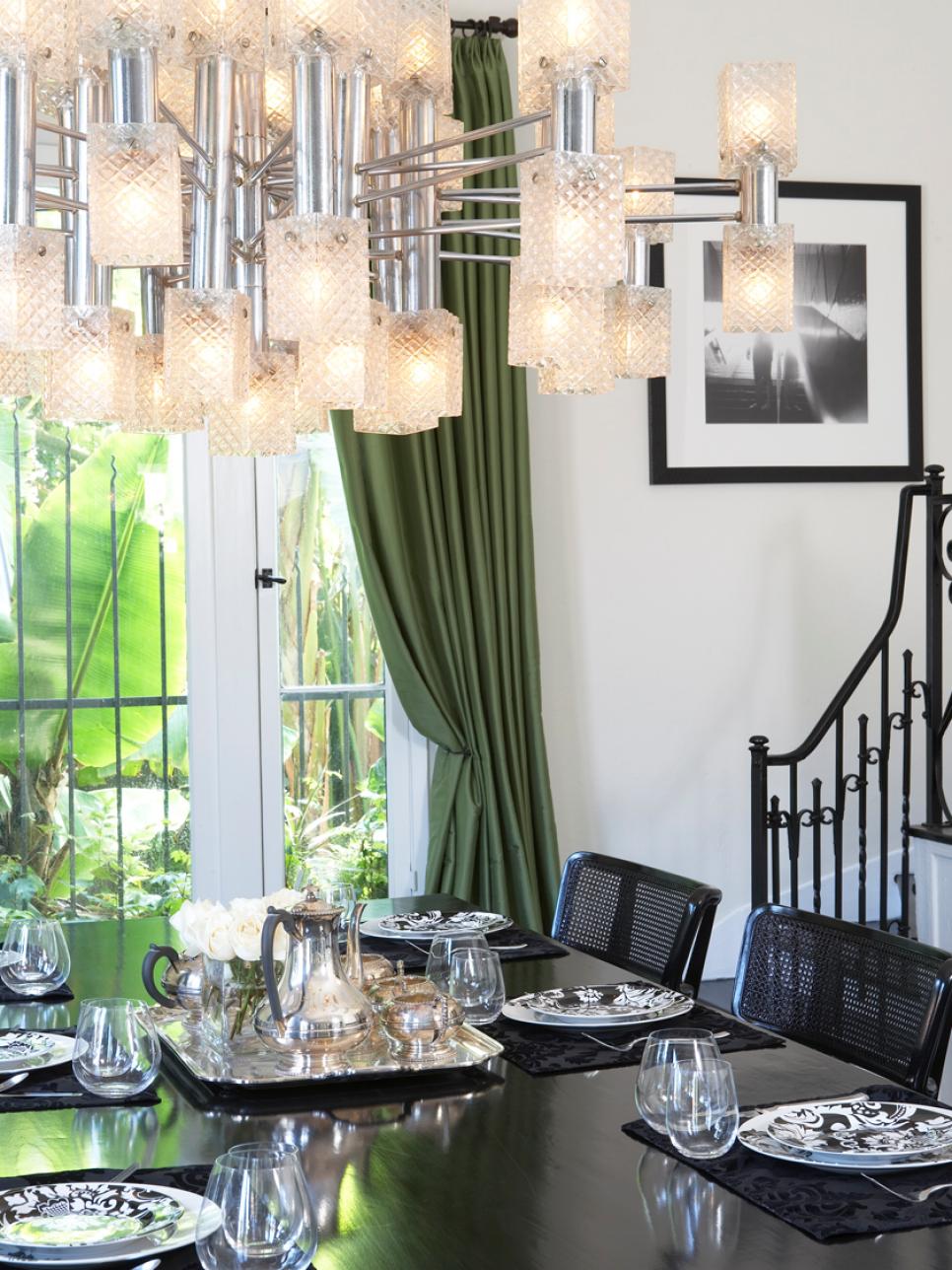 Dining Room With Black Dining Table and Funky Chrome Chandelier