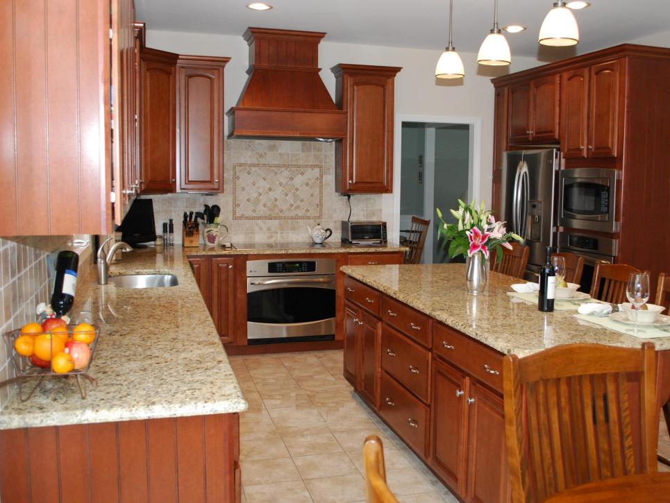 Kitchen With wood Cabinets and Granite Countertops