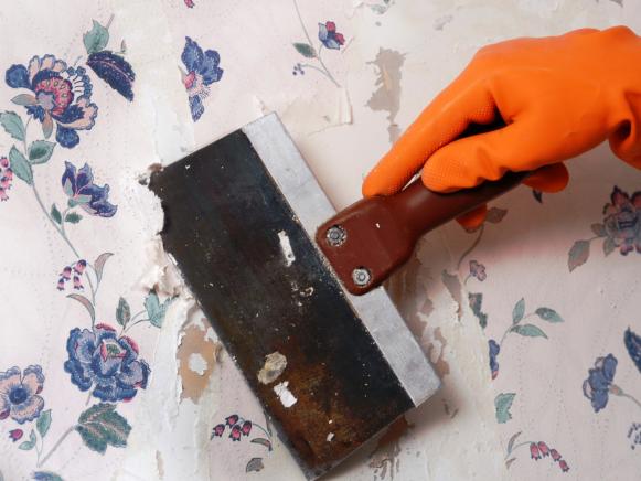 Hold Scraper at Angle and Scrape Paper in Sections Hold Scraper at Angle and Scrape Paper in Sections