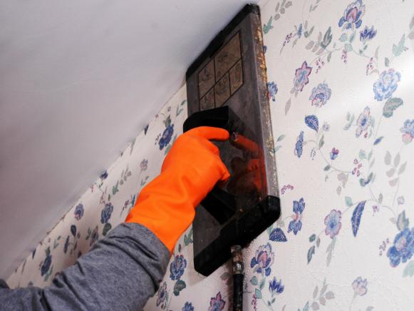 Place Steamer on Surface of Wall to Penetrate Glue Place Steamer on Surface of Wall to Penetrate Glue