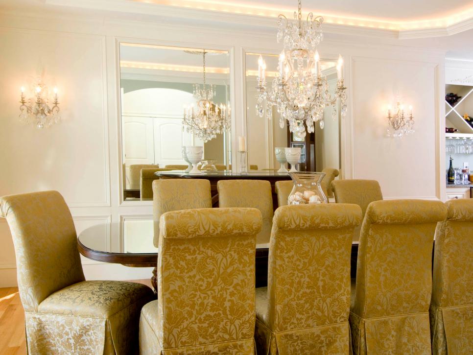 Dining Room With Chandelier and Gold Dining Chairs