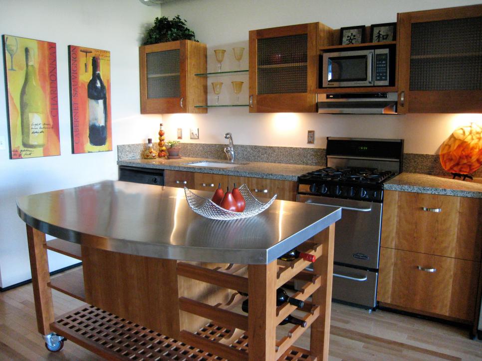 Contemporary Kitchen With Mobile Island and Stainless Steel Appliances