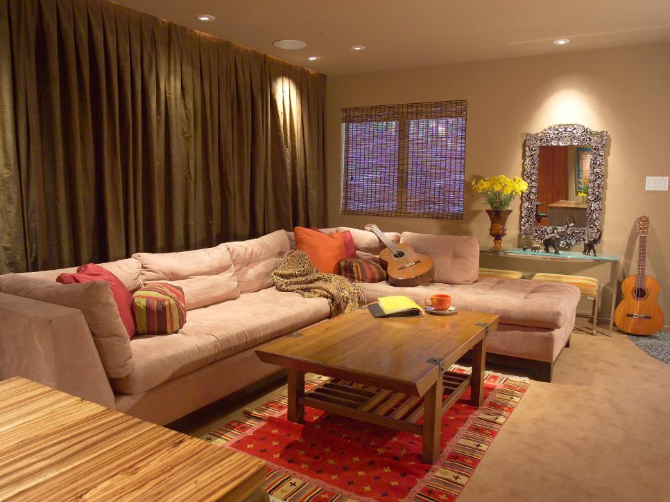 Asian-Style Living Room With Neutral Walls, Sectional and Large Curtain