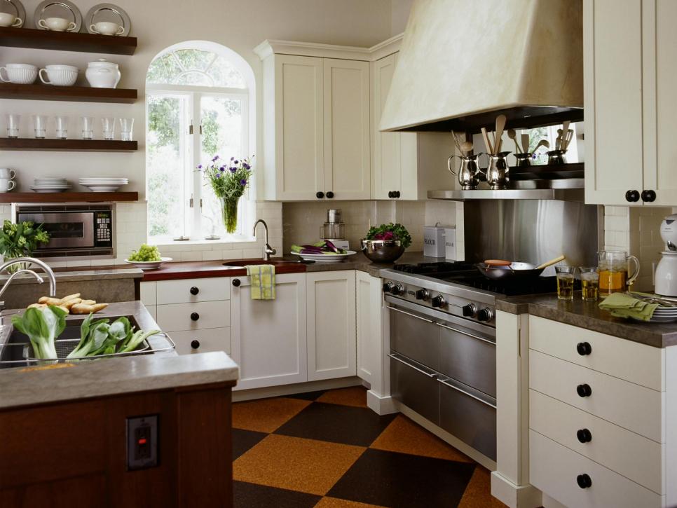 Country Kitchen With White Cabinets and Dark Wood Floating Shelves