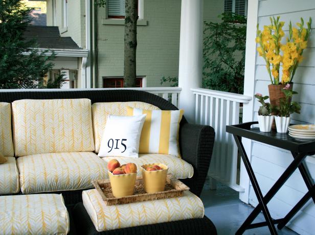 Front Porch With Black Wicker Furniture and Yellow Accents Front Porch With Black Wicker Furniture and Yellow Accents