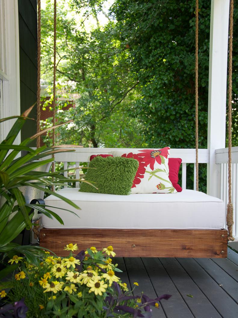 Porch Swing with Flower Pillows 