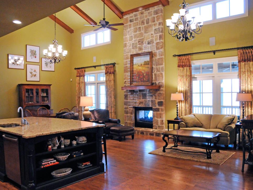 Split Living Room and Kitchen With Large Stone Fireplace