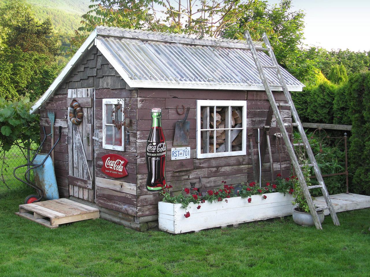 shed with vintage charm a tin roof tops this rustic backyard shed 