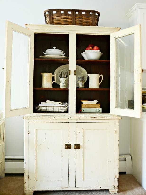 Shabby-Chic Kitchen Hutch Holding Dishes