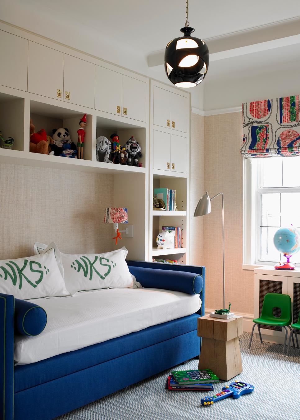 Contemporary Kids' Room With Blue Daybed and Built In Storage Shelves