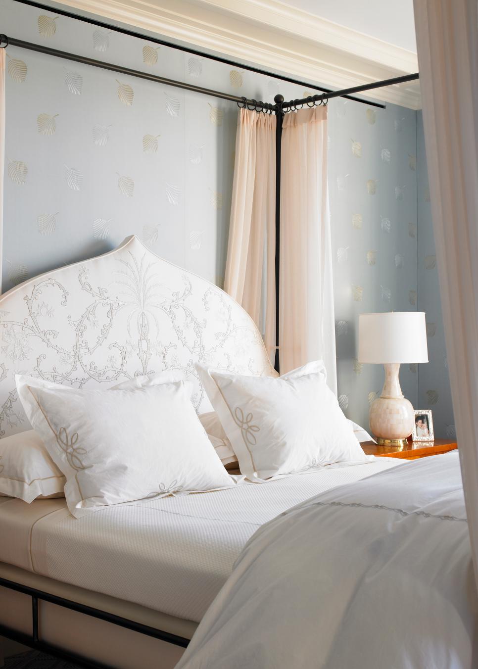 Elegant White Bedding in Transitional Bedroom Iron Canopy Bed With White Bedding and Headboard