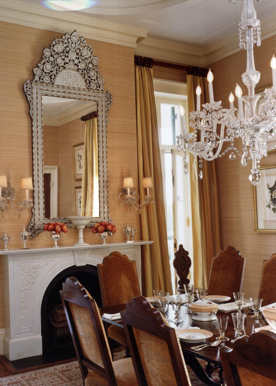 Traditional Dinning Room With Ornate Chandelier and Mirror