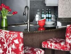 Contemporary Black Metallic Kitchen With Red and White Bar Chairs 