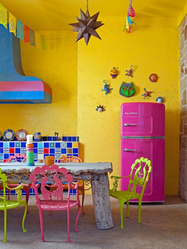 Yellow Spanish-Style Kitchen With Retro Pink Refrigerator Yellow Spanish-Style Kitchen With Retro Pink Refrigerator
