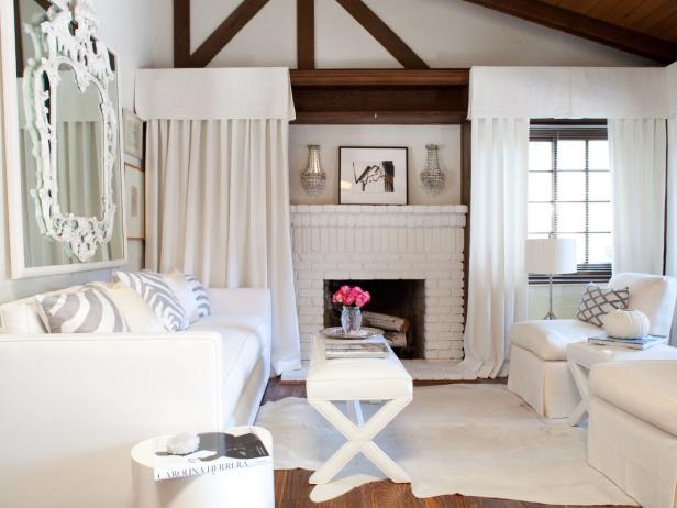 White Living Room With Exposed Ceiling Beams