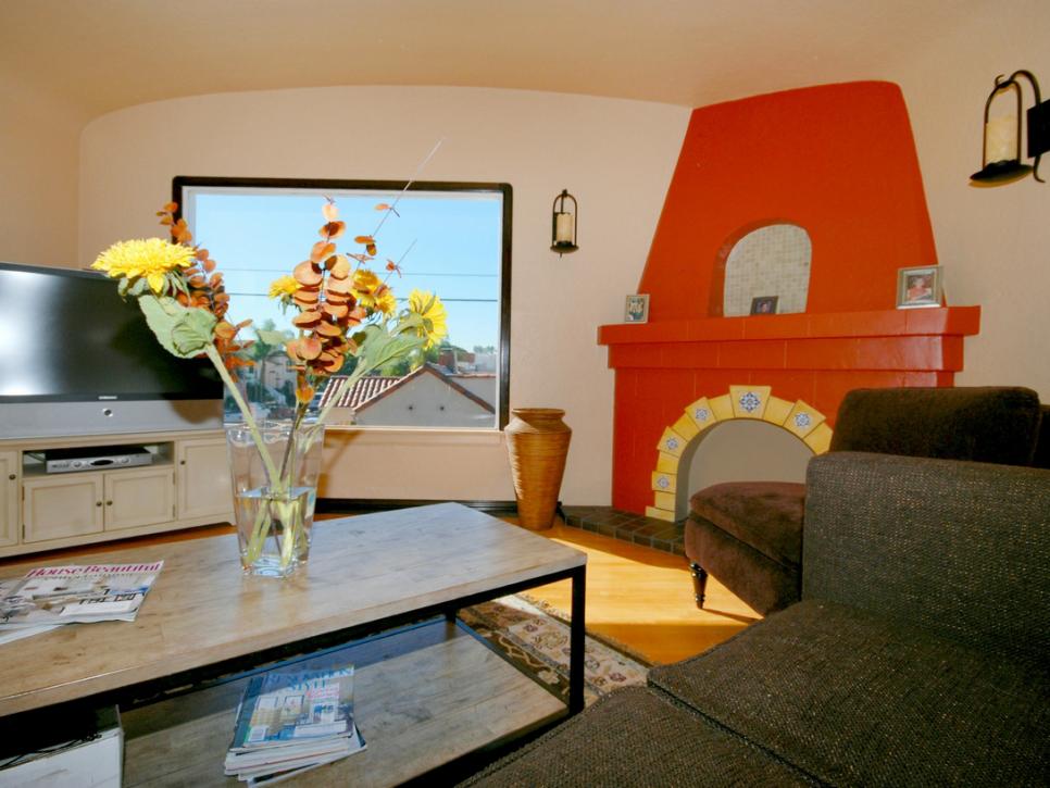 Spanish Living Room With Orange Fireplace