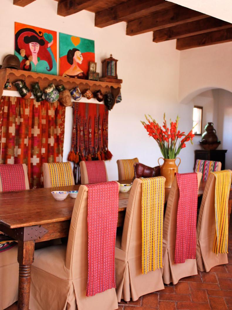 Colorful Mediterranean Dining Space With Spanish Art